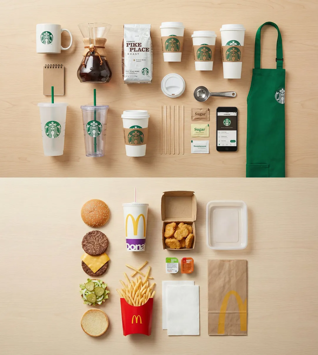 Overhead knolling of Starbucks and McDonald's products on wood surface, AI generated
