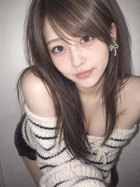 A young woman in an off-shoulder striped sweater leaning forward under direct flash against a wall., generated with GPT Image